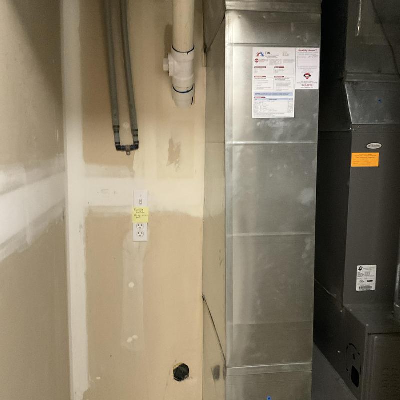 Water softener installation area with plumbing pipes Water softener installation area with plumbing pipes