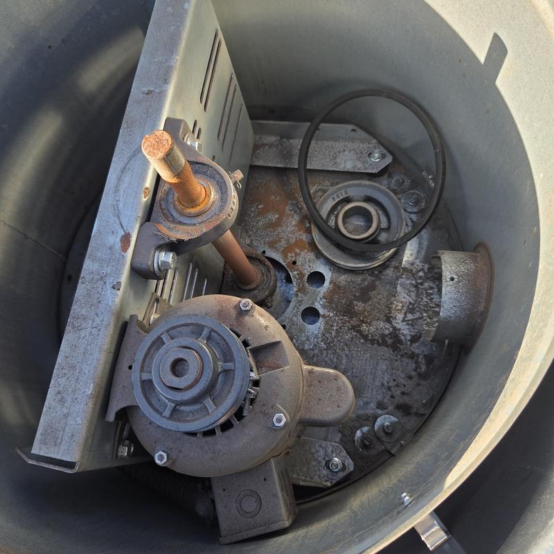 Evaporative cooler blower motor and belt inside housing Evaporative cooler blower motor and belt inside housing