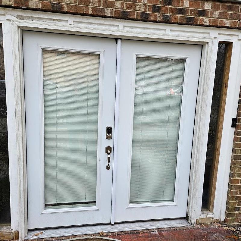 Exterior double glass doors with blinds and keypad lock Exterior double glass doors with blinds and keypad lock