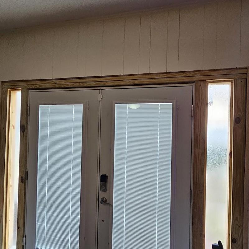 French door with interior blinds and wood trim installation French door with interior blinds and wood trim installation