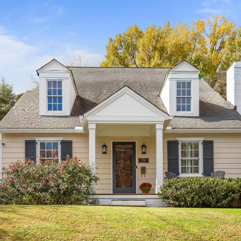 Roof shingles and dormer windows on residential home Roof shingles and dormer windows on residential home