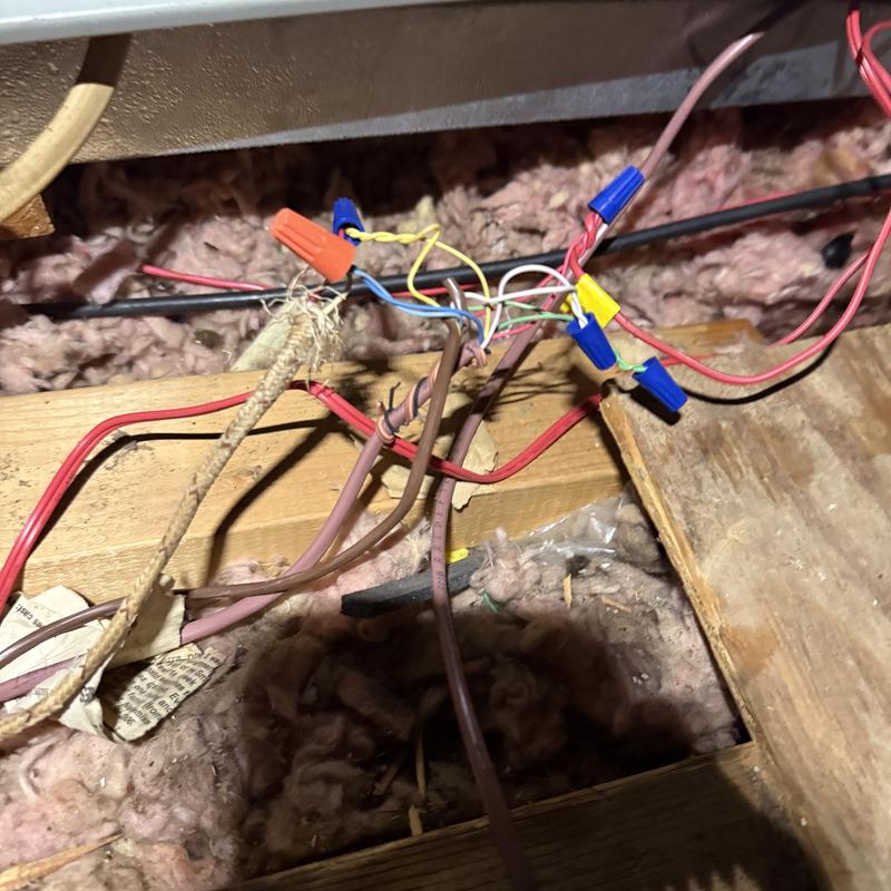 Electrical wiring splice with wire nuts in attic space Electrical wiring splice with wire nuts in attic space