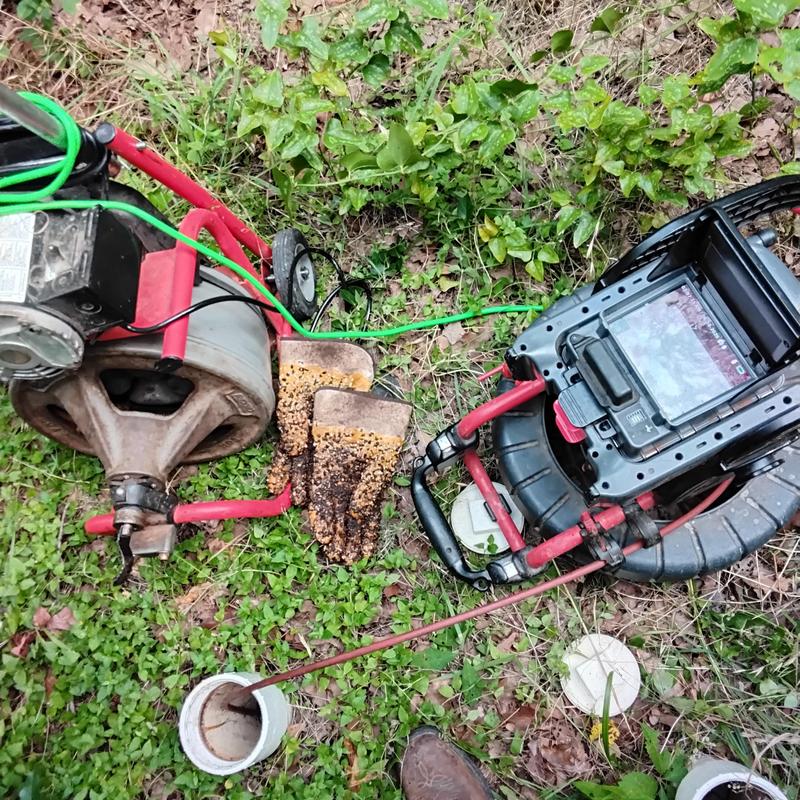 Cast iron branch line scale buildup with drain cable and camera