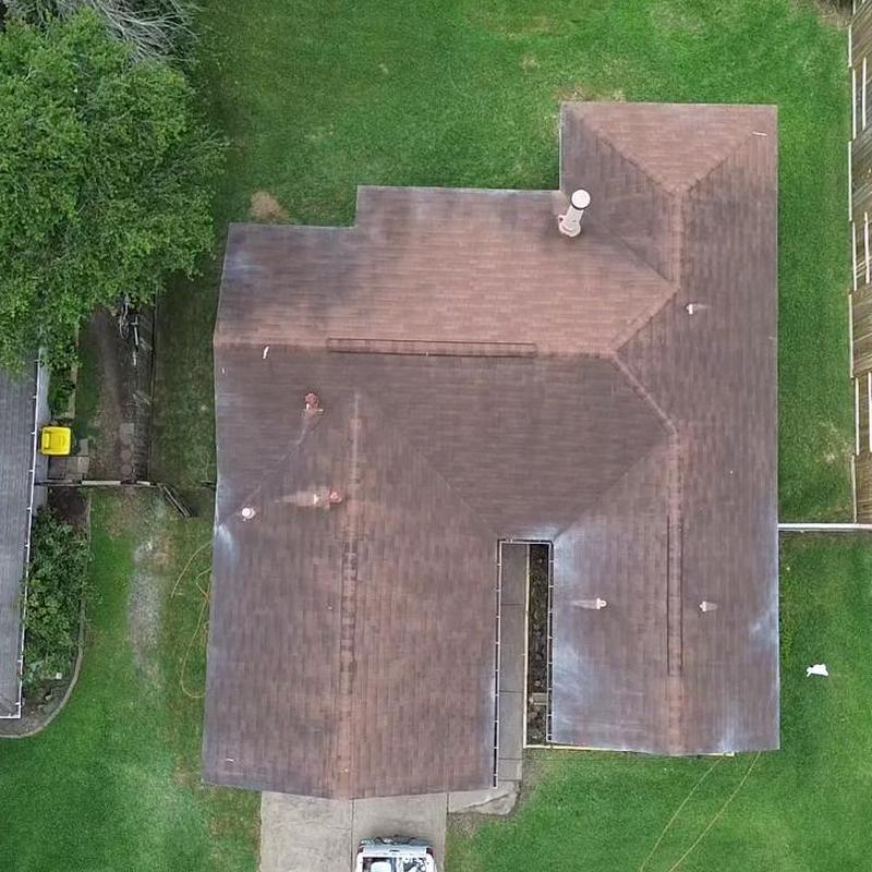 Asphalt shingle roof aged wear drone view Pearland TX