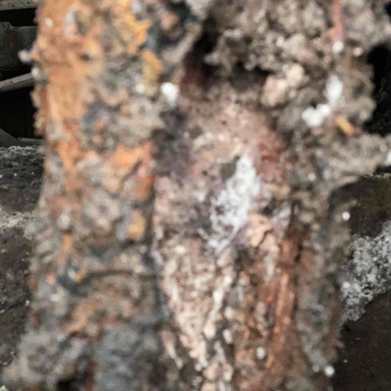Galvanized sink drain pipe with rust damage Galvanized sink drain pipe with rust damage
