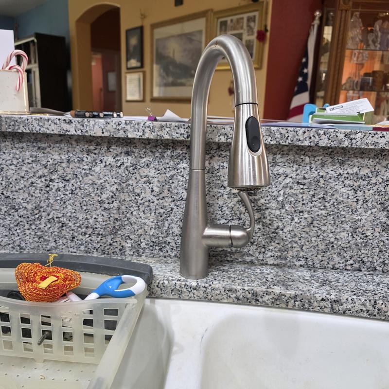 Touch control kitchen faucet on granite countertop Touch control kitchen faucet on granite countertop