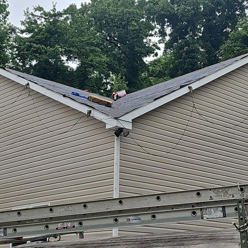 CertainTeed Landmark Charcoal Black roof with new gutters
