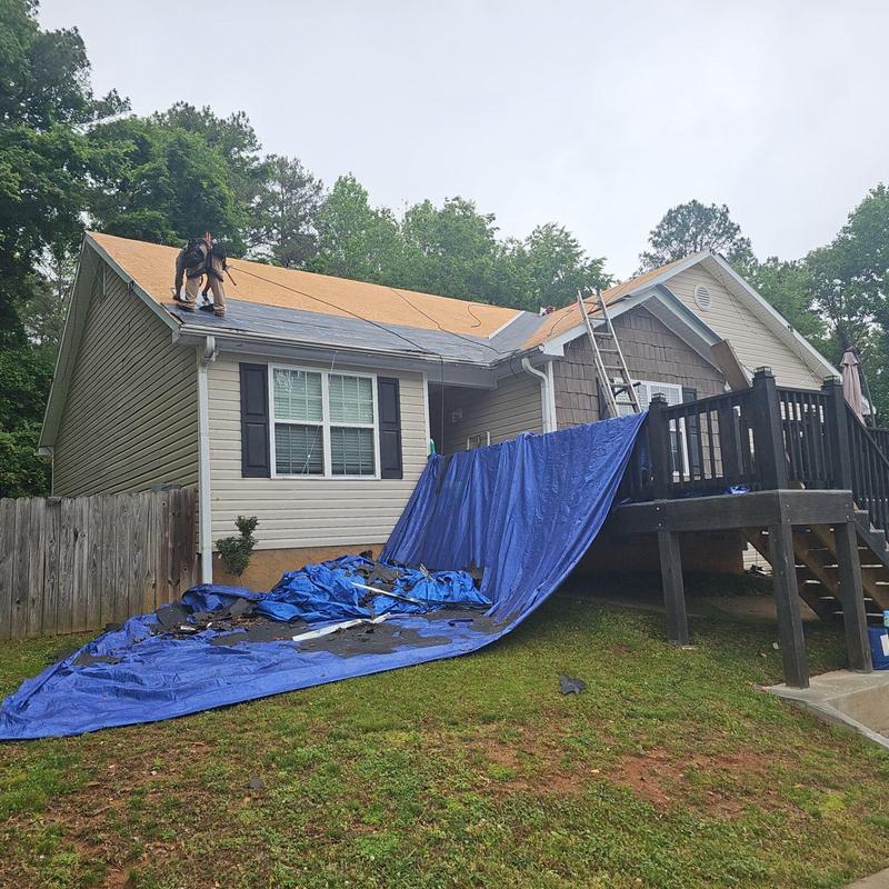 Roof decking replacement with tarp and new underlayment