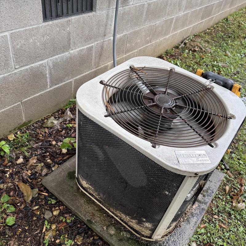 Air conditioner condenser unit with bent coils and rust Air conditioner condenser unit with bent coils and rust