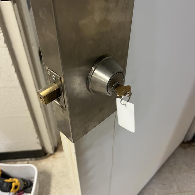 Deadbolt lock with key in basement door