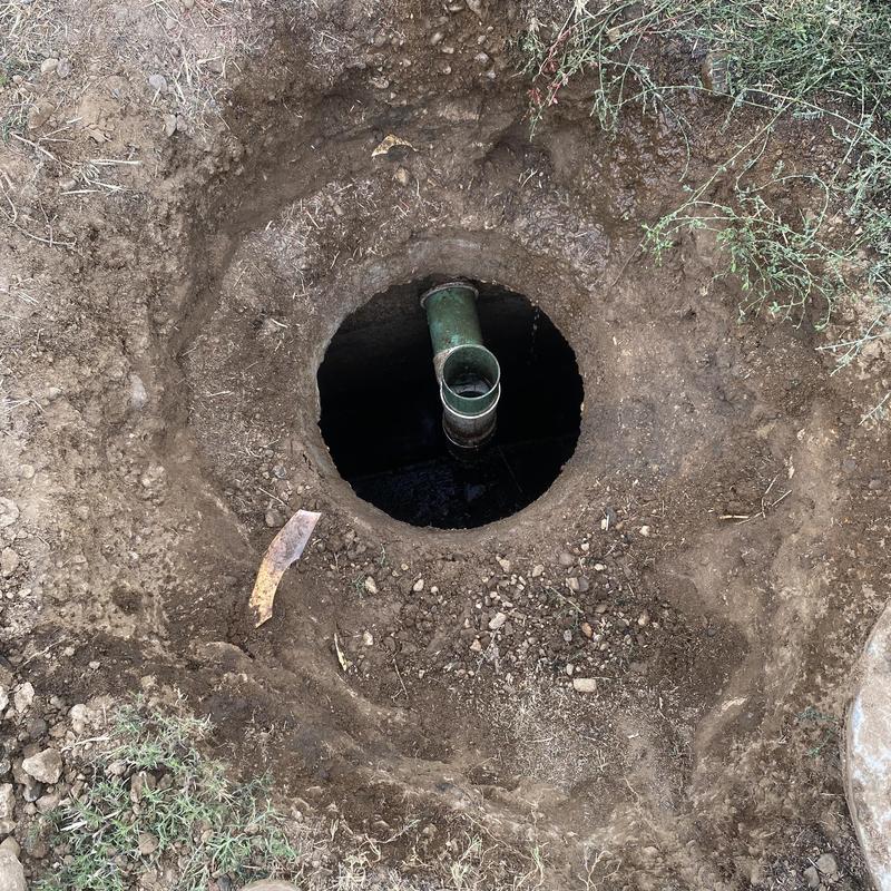Septic tank inlet pipe exposed for repair and inspection Septic tank inlet pipe exposed for repair and inspection
