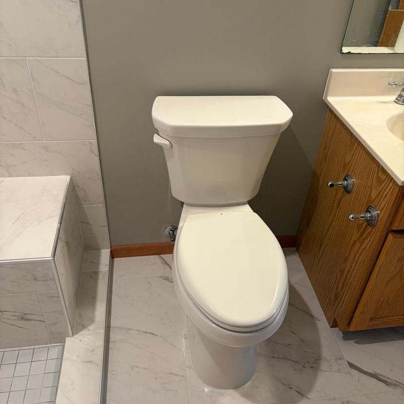 Toilet fixture installed in bathroom remodel