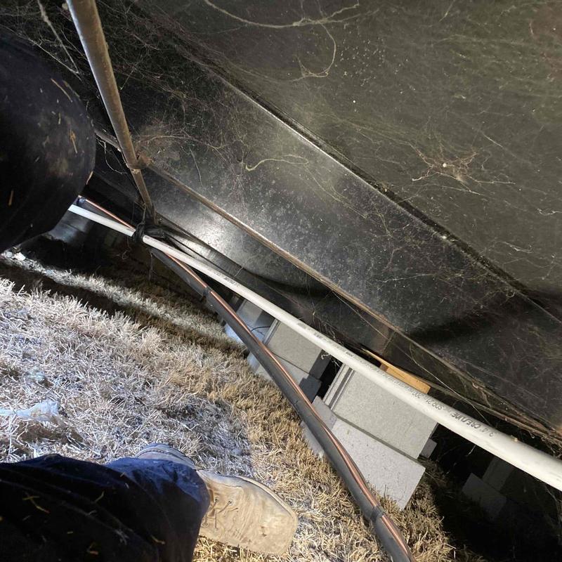 Furnace ductwork and piping in crawl space installation Furnace ductwork and piping in crawl space installation