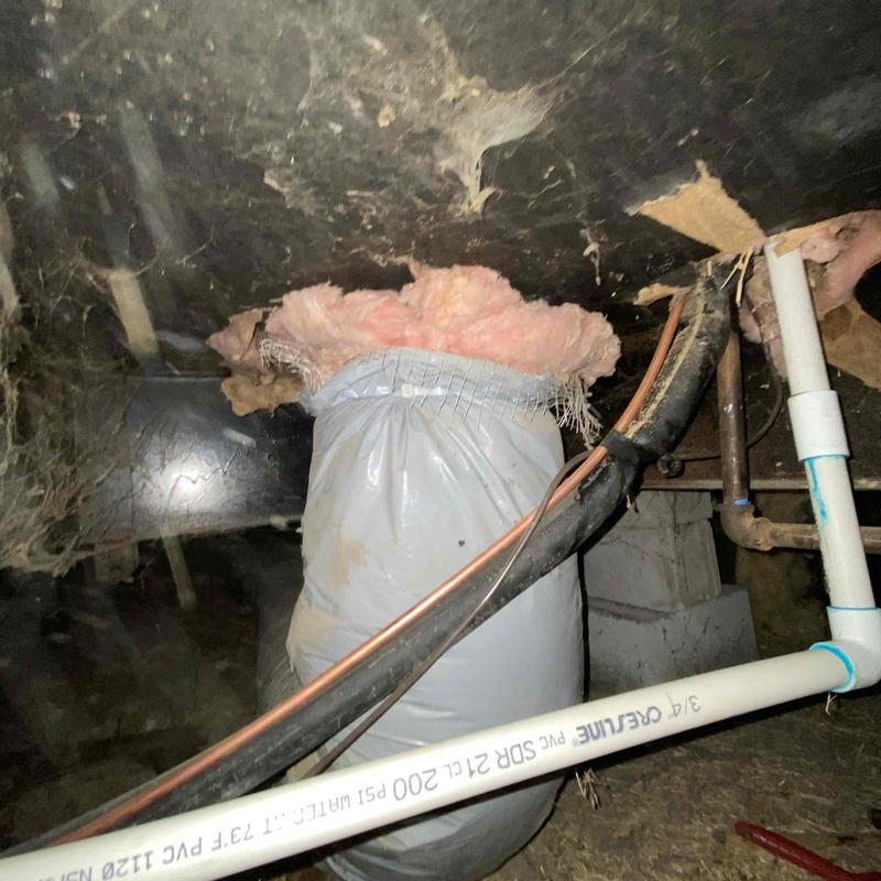 Ductwork sealed with insulation and plastic wrap Ductwork sealed with insulation and plastic wrap