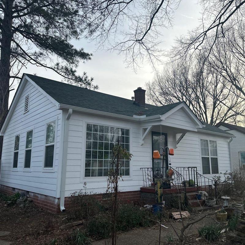 Owens Corning Oakridge asphalt roofing system on house Owens Corning Oakridge asphalt roofing system on house