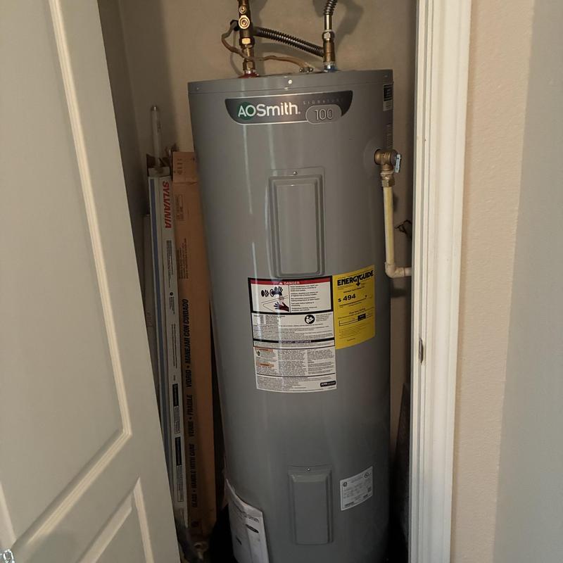 AO Smith water heater installation in utility closet