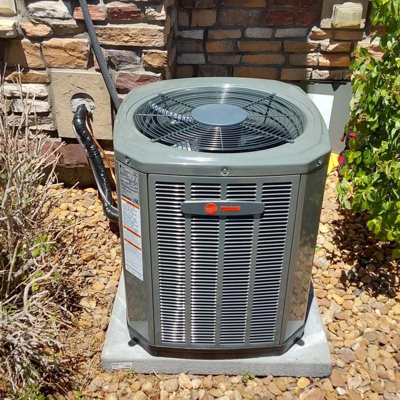 Trane 5TTR30 air conditioner unit installed outside