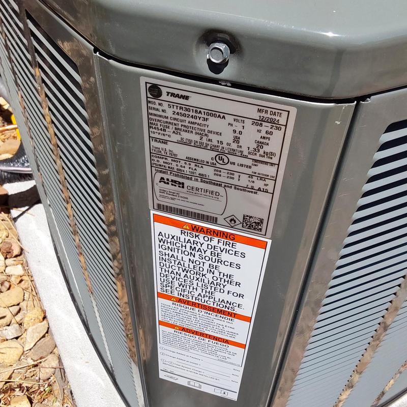 Trane 5TTR30 air conditioner installation label close-up