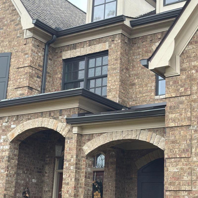 Roof system with gutters and brick facade in Brentwood