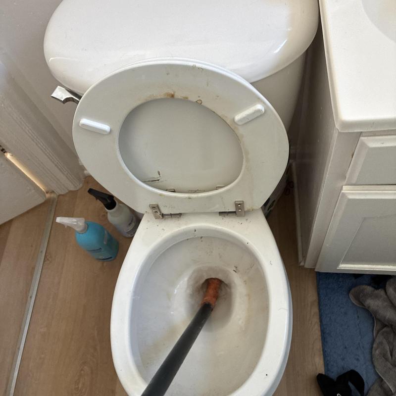 Toilet bowl clog clearing with plunger tool