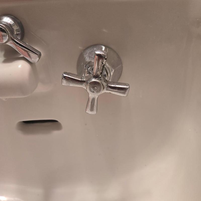 Bathroom sink cold-water faucet handle and basin