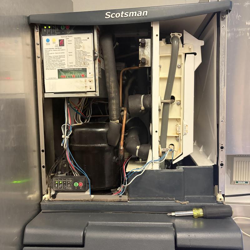 Scotsman ice machine interior with components and wiring Scotsman ice machine interior with components and wiring