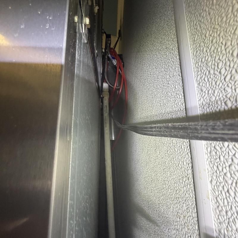 Ice machine rear panel and wiring inspection in tight space Ice machine rear panel and wiring inspection in tight space