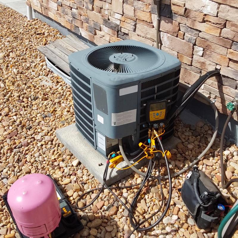 Goodman GSX13 air conditioner refrigerant charging setup