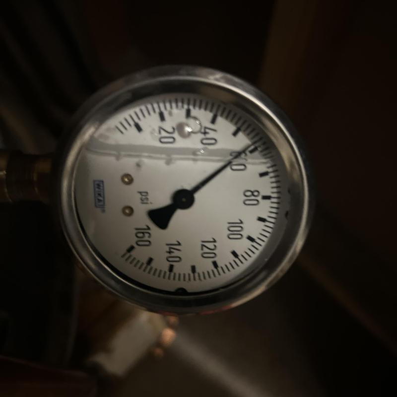 Pressure gauge on hose bib waterline reading 50 psi