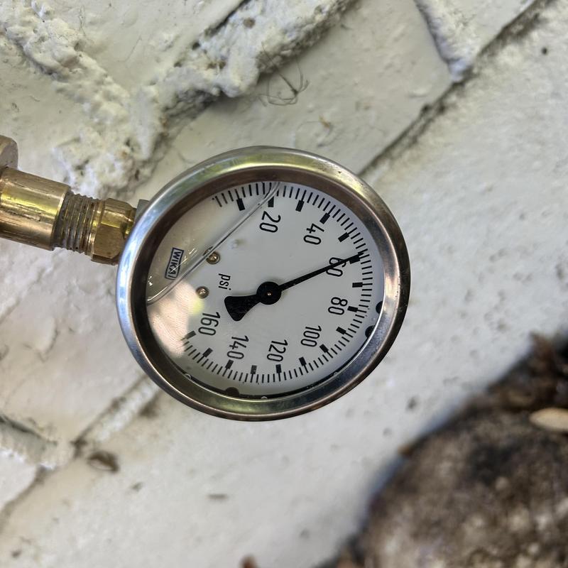 Water pressure gauge on hose bib connection in Boise