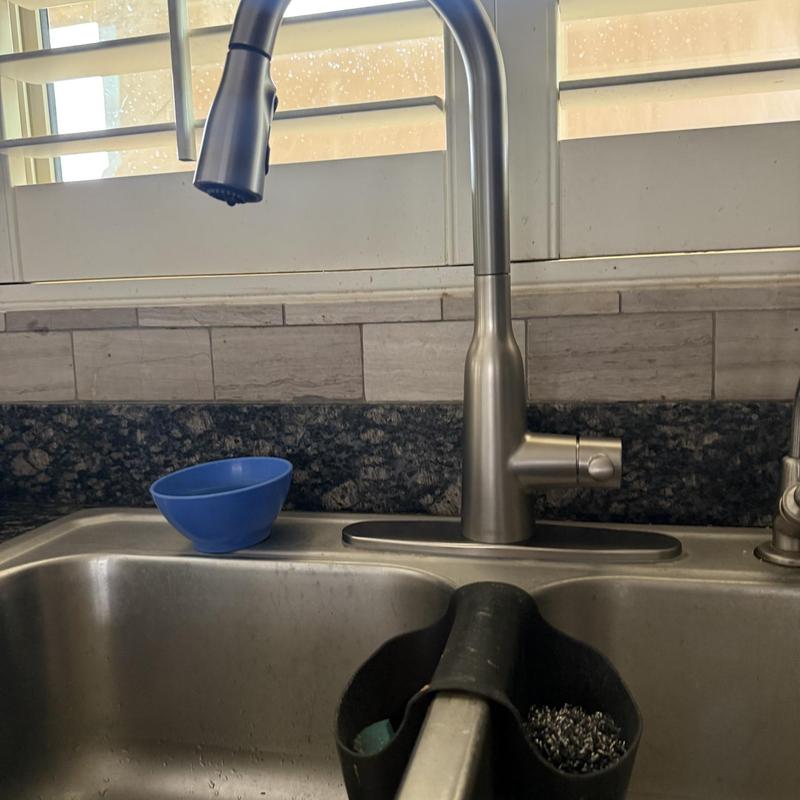Kitchen faucet with pull-down sprayer and sink setup