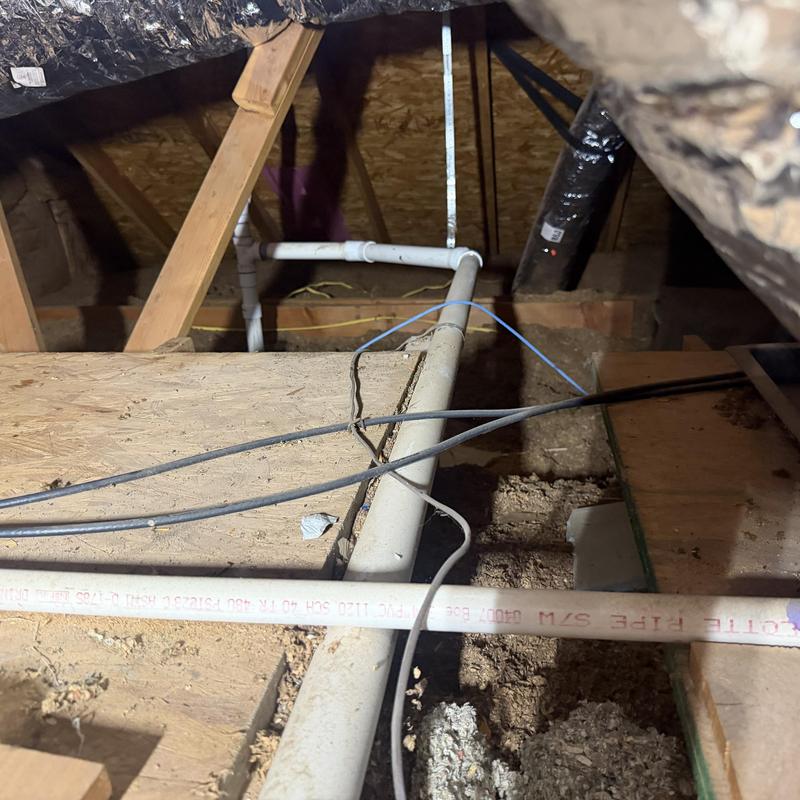 PVC condensate drain pipe in attic space installation PVC condensate drain pipe in attic space installation