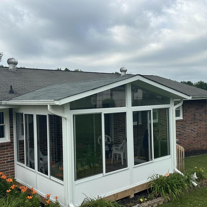 Sunroom roof with asphalt shingles and gutter system Sunroom roof with asphalt shingles and gutter system
