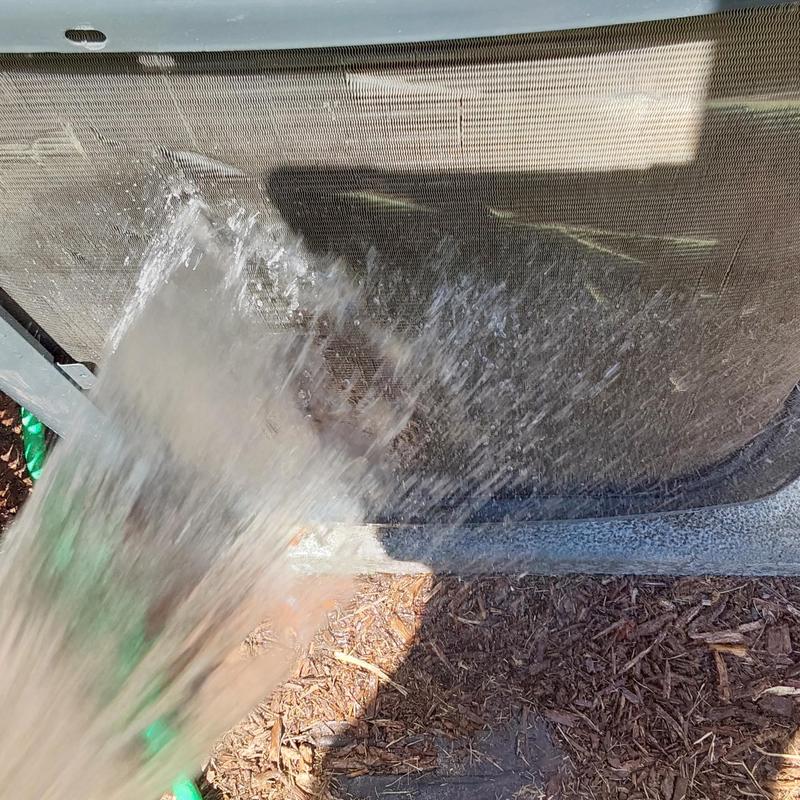 Goodman GSX13 condenser coil cleaning with hose spray