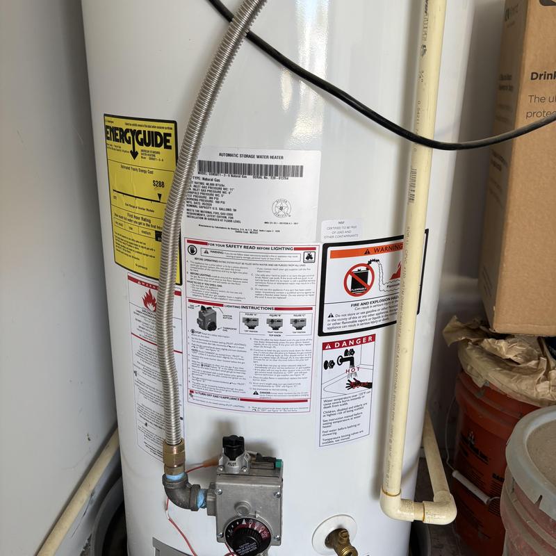 Water heater with control valve and piping connections