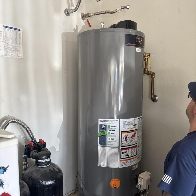 50 Gallon gas water heater installation in utility room