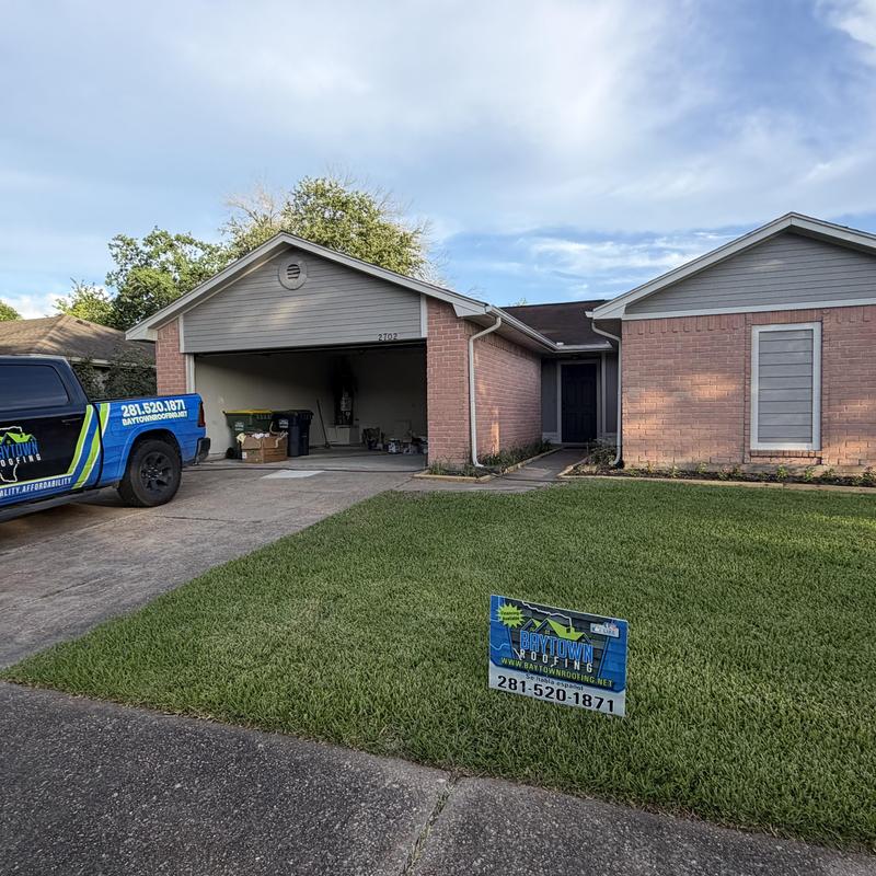 Asphalt shingle roof replacement on brick home