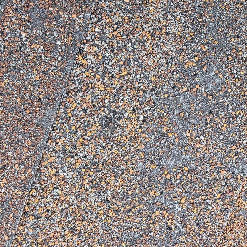 Asphalt shingle roof granule loss from hail damage