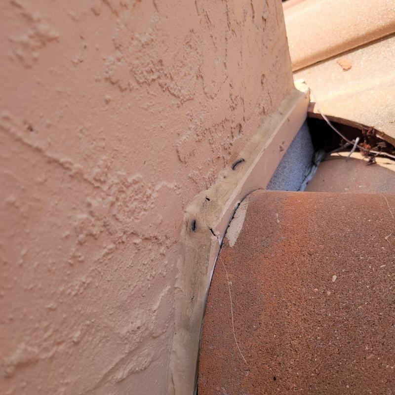 Concrete tile roof flashing sealant with minor cracks Concrete tile roof flashing sealant with minor cracks