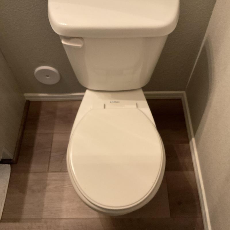 Toilet installation in small bathroom corner space Toilet installation in small bathroom corner space