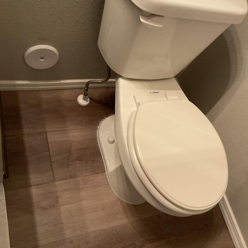 Toilet installation with new water supply line in bathroom Toilet installation with new water supply line in bathroom