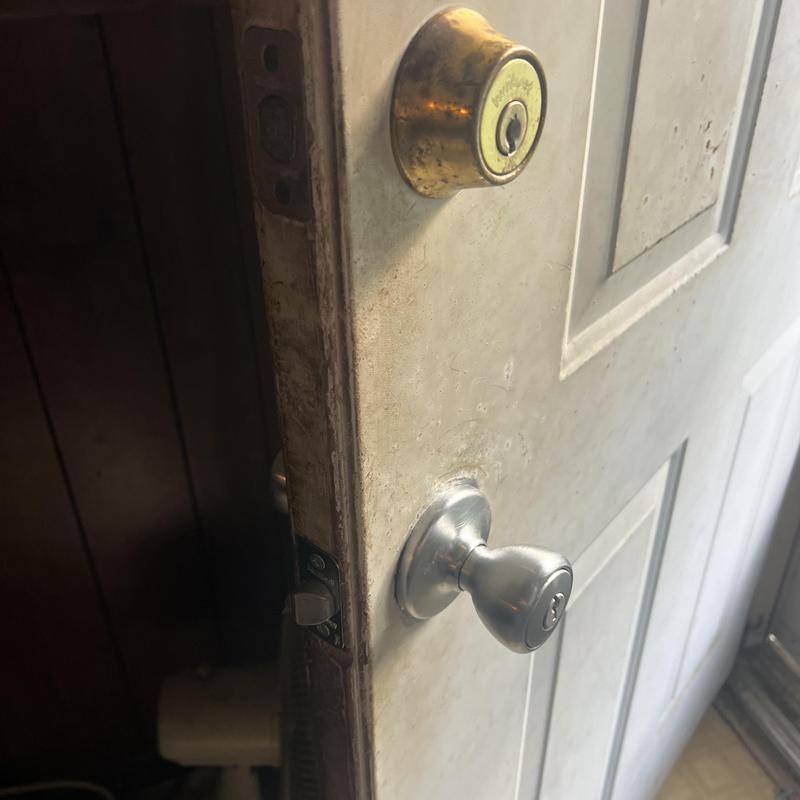 Kwikset door knob with rekeyed deadbolt lock