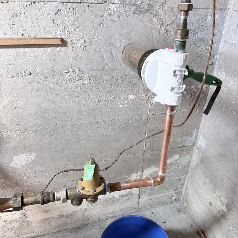 Water meter piping with shutoff valve and pressure regulator Water meter piping with shutoff valve and pressure regulator