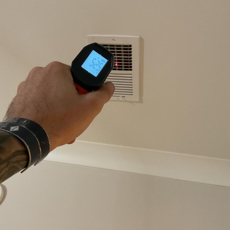 Air vent temperature check with infrared thermometer Air vent temperature check with infrared thermometer