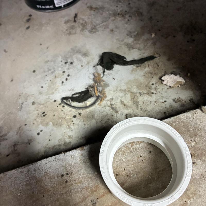 Drain pipe debris removal in dental office AC system area