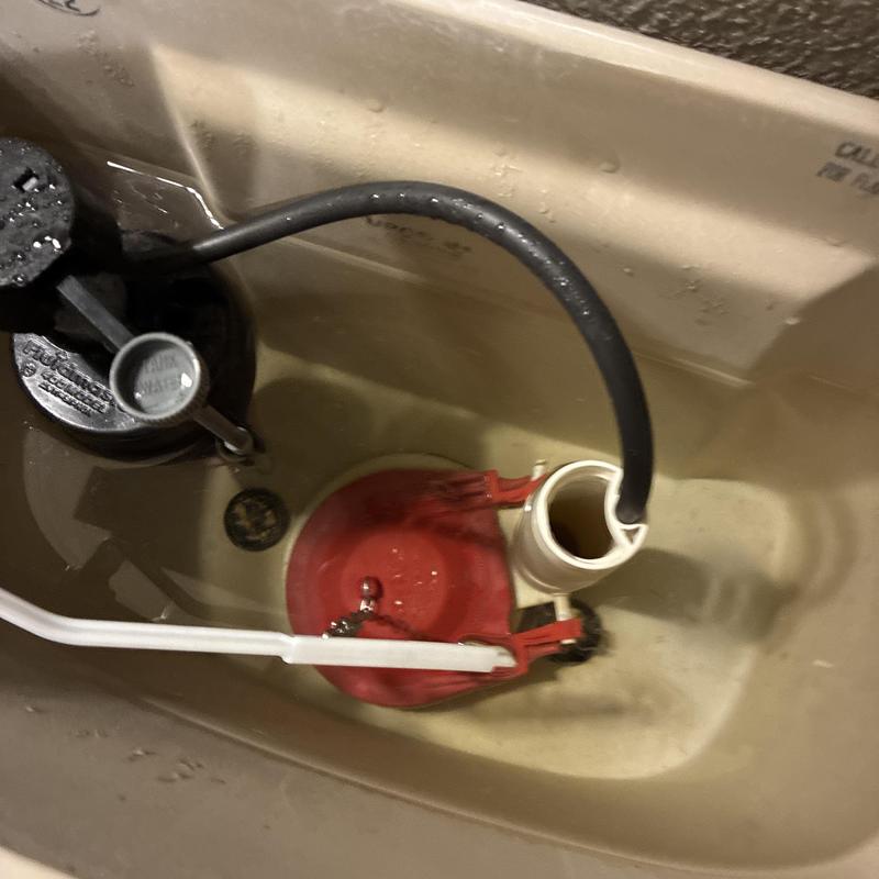 Toilet flush valve and flapper installation inside tank