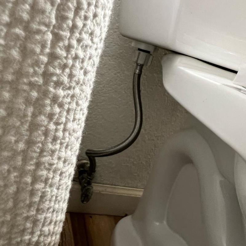 Toilet fill valve and supply line installation in bathroom
