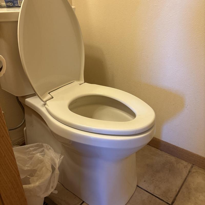 Kohler toilet installation in bathroom corner Kohler toilet installation in bathroom corner