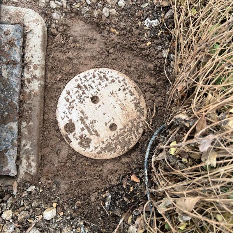 Water valve riser installed with new landscape cover box