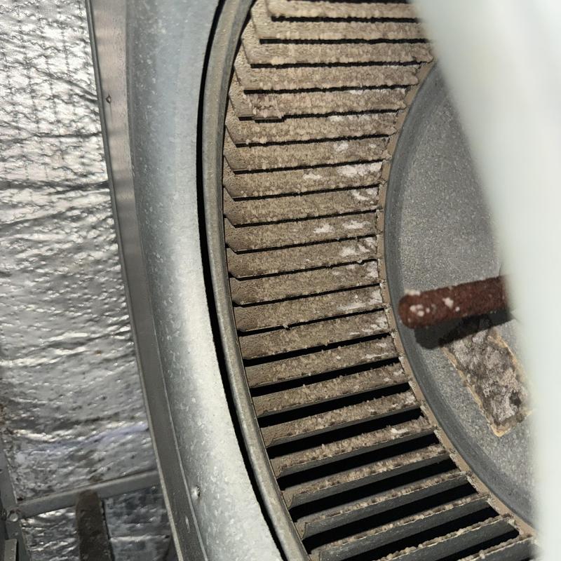Dirty HVAC blower wheel with dust buildup interior view Dirty HVAC blower wheel with dust buildup interior view